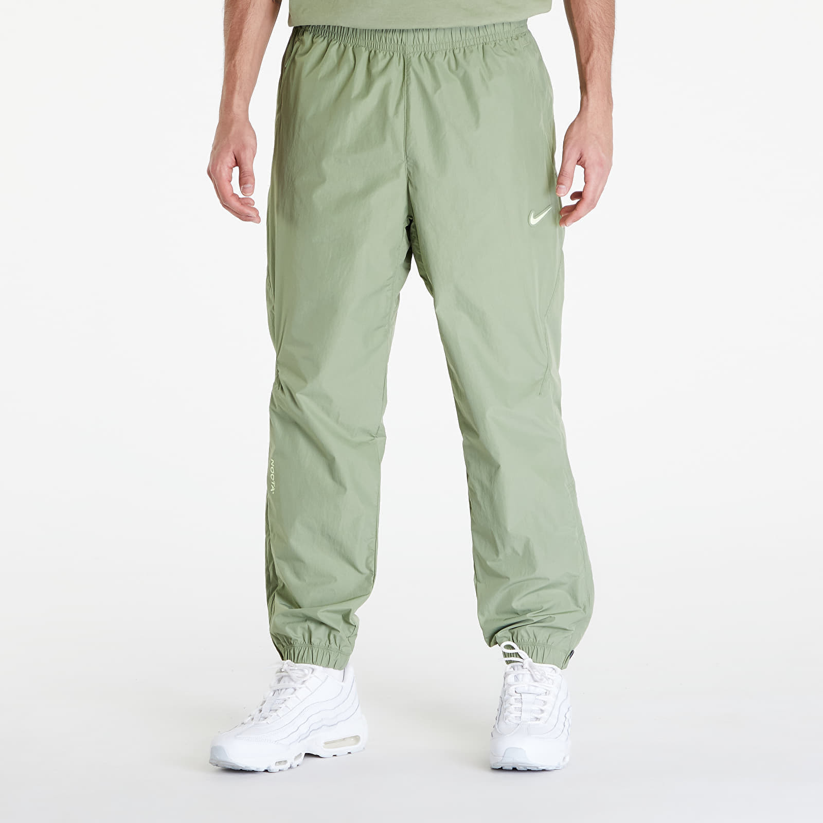 Pants Nike x NOCTA Woven Track Pants Oil Green/ Light Liquid Lime XS